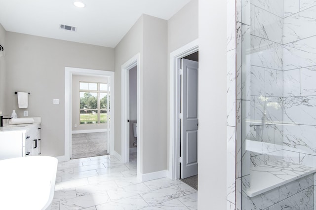 15034 Wunderlust Ln, Houston, TX 77069 - full bathroom with a freestanding bath, marble finish flooring, vanity, a marble finish shower, and recessed lighting