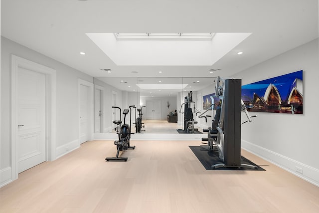 3649 Chevy Chase Dr, Houston, TX 77019 - exercise room featuring a skylight, light wood-style floors, and recessed lighting