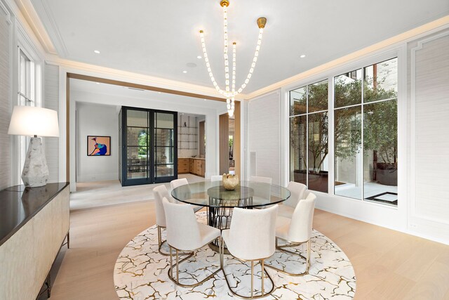 3649 Chevy Chase Dr, Houston, TX 77019 - dining space with ornamental molding, light wood finished floors, plenty of natural light, and recessed lighting