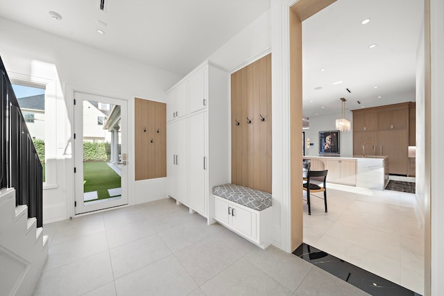 3649 Chevy Chase Dr, Houston, TX 77019 - mudroom with light tile patterned floors