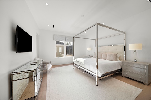 3649 Chevy Chase Dr, Houston, TX 77019 - bedroom with light wood finished floors and recessed lighting