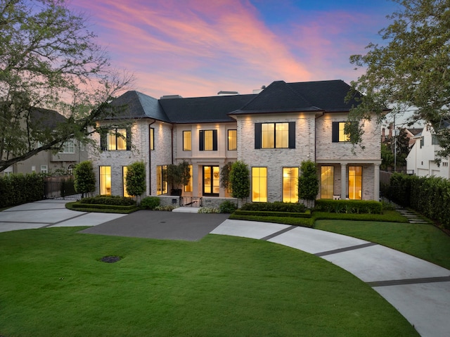 3649 Chevy Chase Dr, Houston, TX 77019 - french country style house with brick siding and driveway