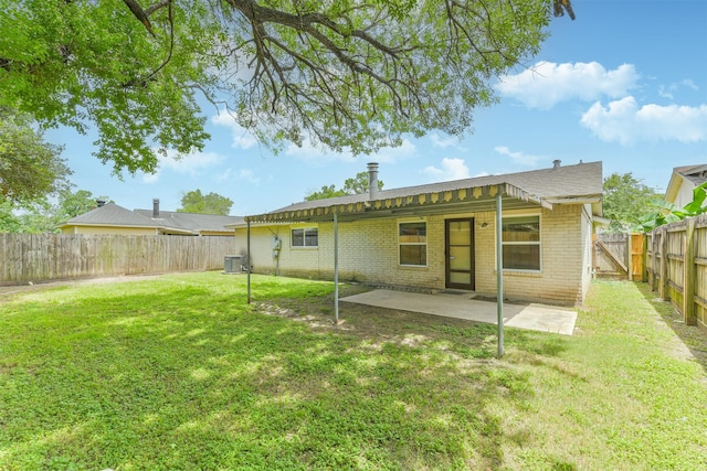 11611 Old Telegraph Rd, Houston, TX 77067 - back of house featuring brick siding, a patio area, and a fenced backyard