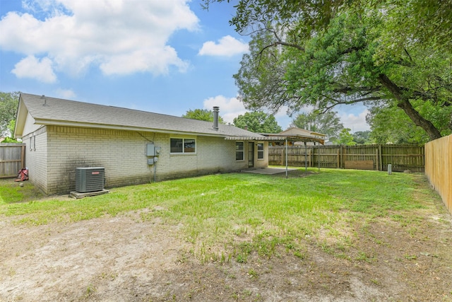 11611 Old Telegraph Rd, Houston, TX 77067 - rear view of house featuring brick siding, a fenced backyard, a patio, and a gazebo