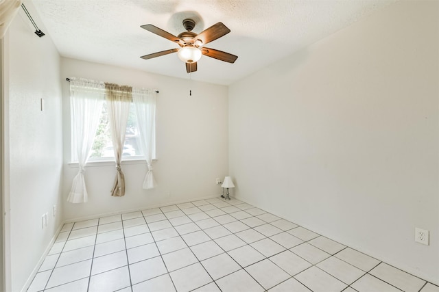 11611 Old Telegraph Rd, Houston, TX 77067 - unfurnished room featuring a ceiling fan, a textured ceiling, and light tile patterned flooring