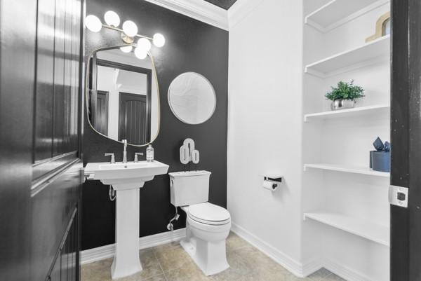2523 Watts St, Houston, TX 77030 - bathroom featuring built in shelves and tile patterned floors