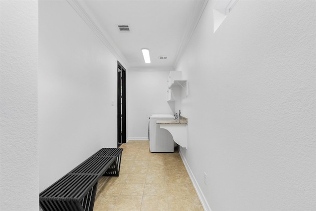 2523 Watts St, Houston, TX 77030 - hall with ornamental molding and washer / clothes dryer