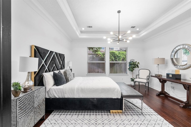 2523 Watts St, Houston, TX 77030 - bedroom featuring hardwood / wood-style floors, a tray ceiling, a chandelier, crown molding, and recessed lighting