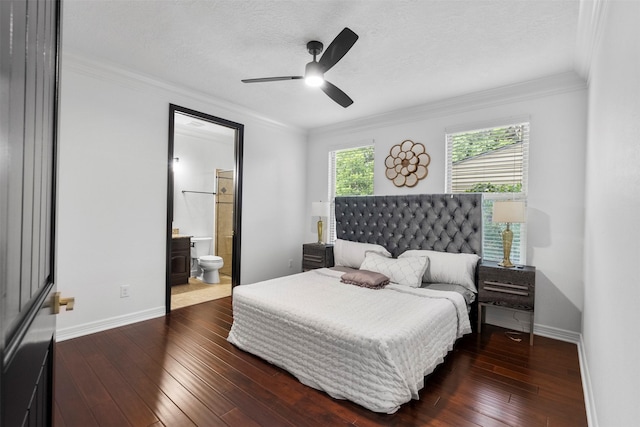 2523 Watts St, Houston, TX 77030 - bedroom featuring crown molding, dark wood-type flooring, a textured ceiling, ensuite bathroom, and ceiling fan
