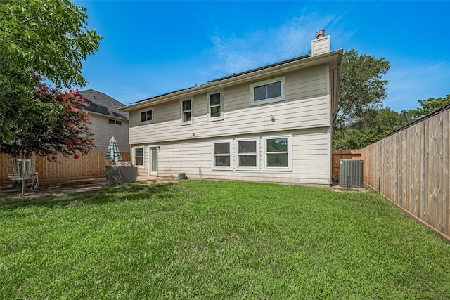 16410 Great Frst, Humble, TX 77346 - back of house featuring a chimney and a fenced backyard