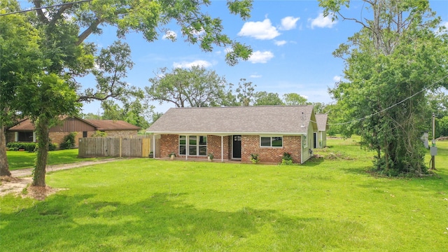 318 Primrose Rd, Jones Creek, TX 77541 - view of front of house with brick siding