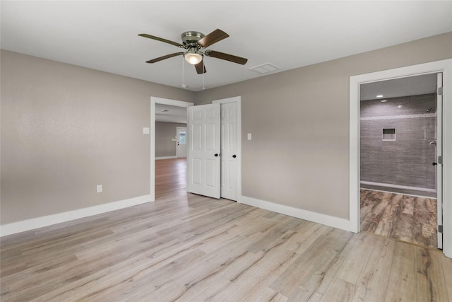 318 Primrose Rd, Jones Creek, TX 77541 - unfurnished room featuring a ceiling fan and wood finished floors
