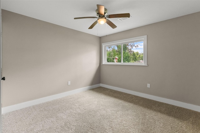 318 Primrose Rd, Jones Creek, TX 77541 - spare room featuring carpet floors and a ceiling fan