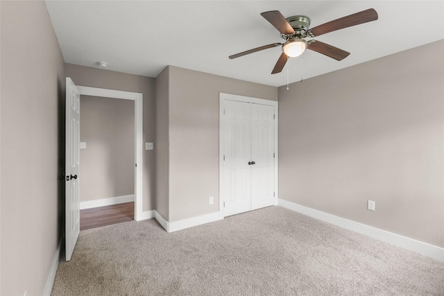 318 Primrose Rd, Jones Creek, TX 77541 - unfurnished bedroom with carpet flooring, a closet, and a ceiling fan