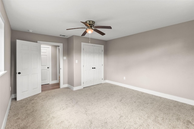 318 Primrose Rd, Jones Creek, TX 77541 - unfurnished bedroom with carpet, ceiling fan, and a closet