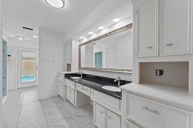 6711 Walton Heath Dr, Houston, TX 77069 - full bathroom with marble finish floors, double vanity, and recessed lighting