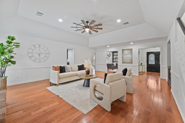 6711 Walton Heath Dr, Houston, TX 77069 - living room with lofted ceiling, ceiling fan, light wood finished floors, and recessed lighting