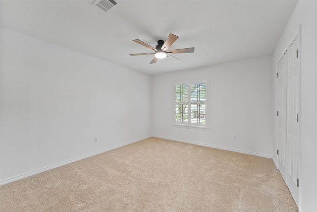 6711 Walton Heath Dr, Houston, TX 77069 - unfurnished bedroom featuring light colored carpet, a ceiling fan, and a closet