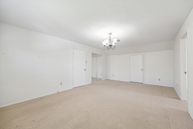 5730 Cartagena St, Houston, TX 77035 - unfurnished room featuring a chandelier and light carpet