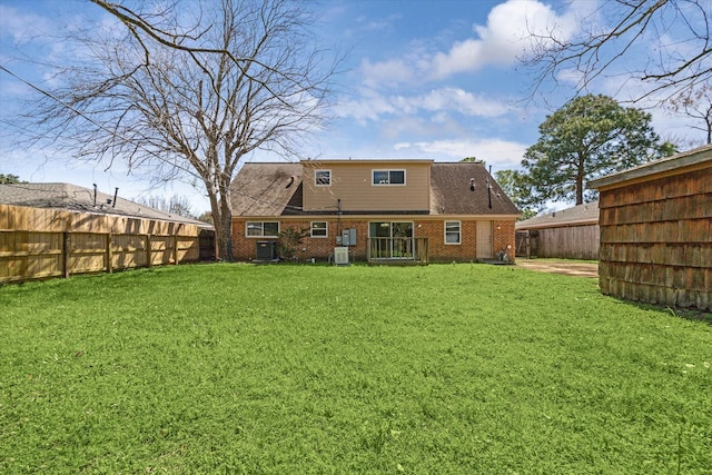 5730 Cartagena St, Houston, TX 77035 - rear view of property with brick siding and a fenced backyard