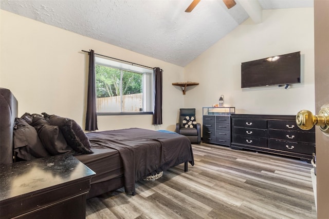 40 Crestbriar Ct, Baytown, TX 77521 - bedroom featuring light wood finished floors, ceiling fan, and a textured ceiling