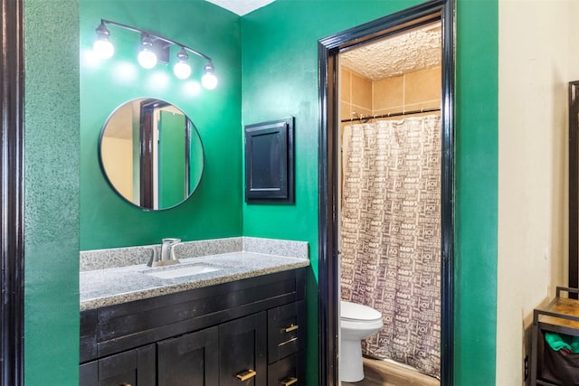 40 Crestbriar Ct, Baytown, TX 77521 - bathroom featuring vanity, wood finished floors, and curtained shower
