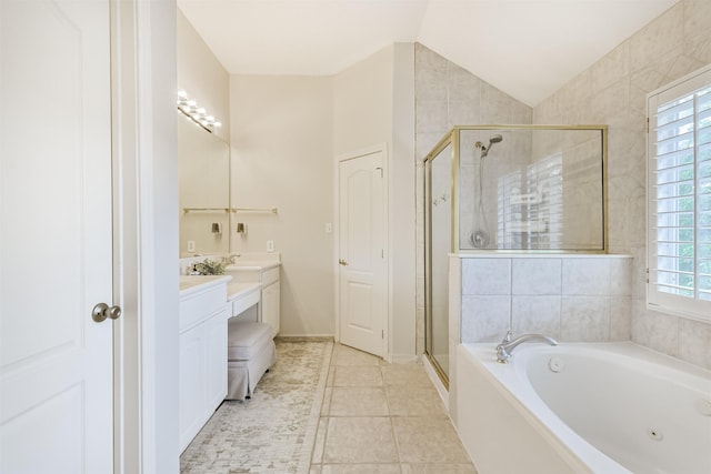 11802 Laurel Meadow Dr, Tomball, TX 77377 - bathroom with vanity, a stall shower, a whirlpool tub, lofted ceiling, and tile patterned floors
