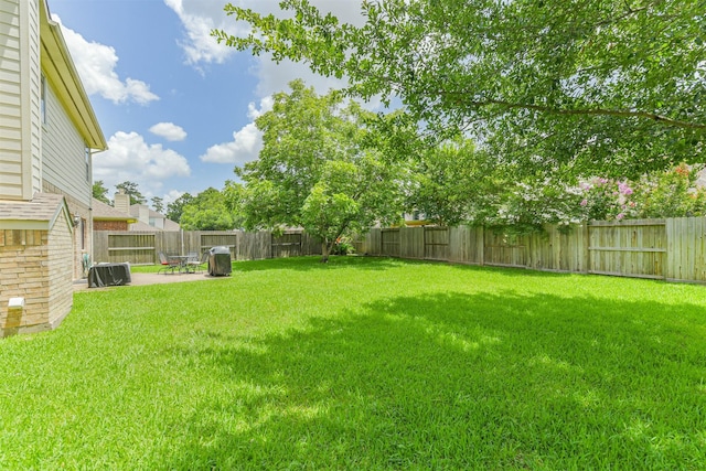 11802 Laurel Meadow Dr, Tomball, TX 77377 - fenced backyard with a patio