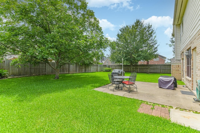 11802 Laurel Meadow Dr, Tomball, TX 77377 - fenced backyard with a patio area