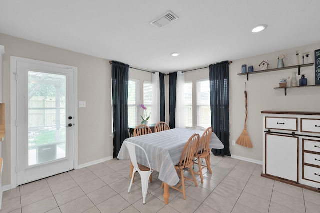 155 Fairwind Trail Dr, Conroe, TX 77385 - dining room with recessed lighting and light tile patterned floors