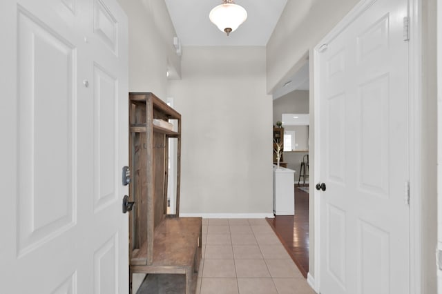 155 Fairwind Trail Dr, Conroe, TX 77385 - foyer entrance with light tile patterned floors and baseboards