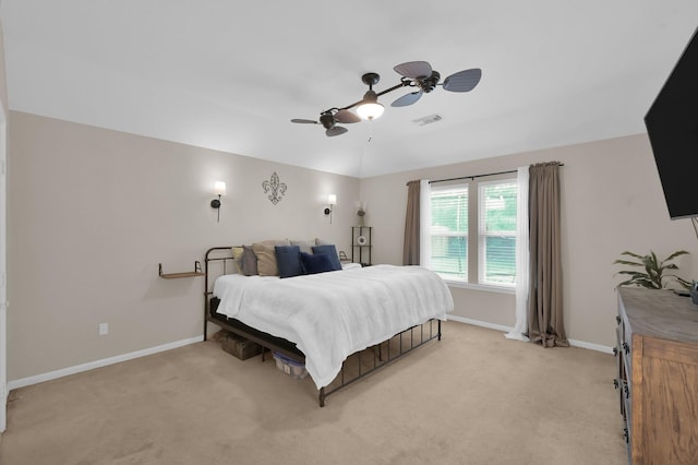 155 Fairwind Trail Dr, Conroe, TX 77385 - bedroom with light colored carpet and a ceiling fan