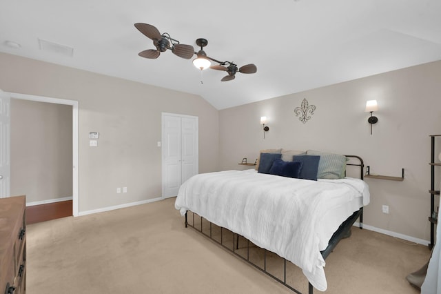 155 Fairwind Trail Dr, Conroe, TX 77385 - bedroom featuring lofted ceiling, light colored carpet, a closet, and a ceiling fan