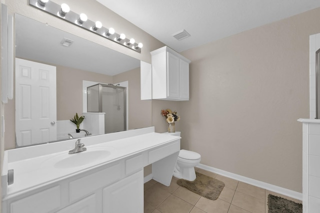 155 Fairwind Trail Dr, Conroe, TX 77385 - bathroom featuring a shower stall, vanity, and tile patterned floors