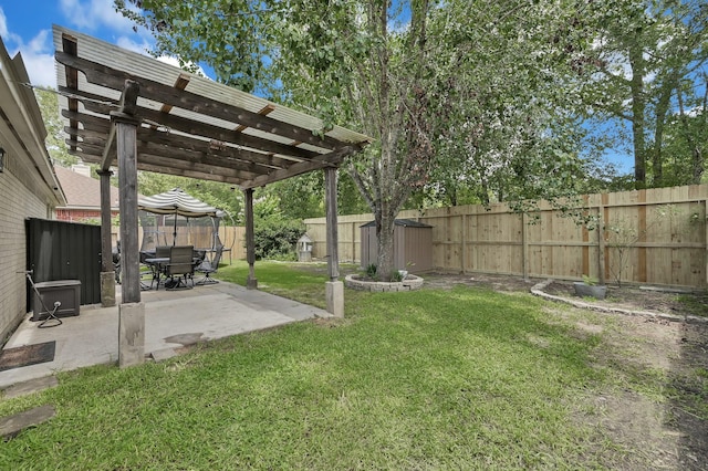 155 Fairwind Trail Dr, Conroe, TX 77385 - fenced backyard with a pergola and a patio