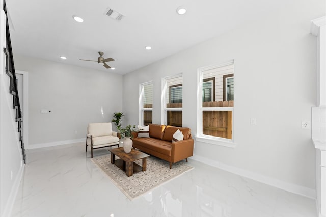 7407 Cora St, Houston, TX 77088 - living area featuring marble finish floors, recessed lighting, and a ceiling fan