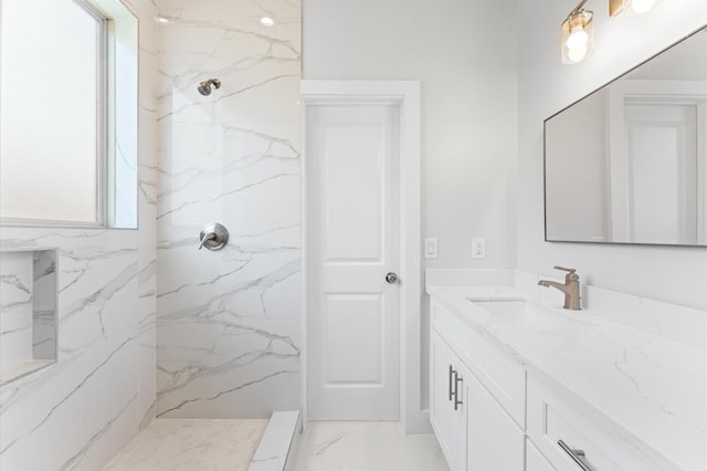 7407 Cora St, Houston, TX 77088 - bathroom with vanity, marble tiled flooring, and a marble finish shower