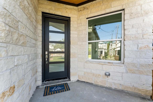 7407 Cora St, Houston, TX 77088 - view of exterior entry featuring stone siding