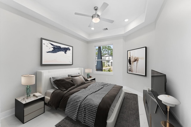 7407 Cora St, Houston, TX 77088 - bedroom featuring a tray ceiling, ceiling fan, and recessed lighting