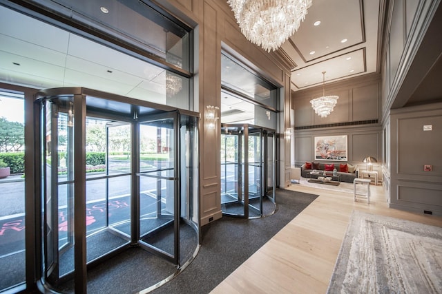 5100 San Felipe St Unit 353, Houston, TX 77056 - common area with a high ceiling, a decorative wall, and recessed lighting