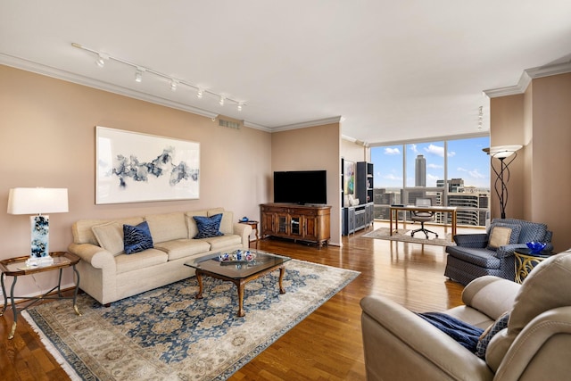 5100 San Felipe St Unit 353, Houston, TX 77056 - living room featuring ornamental molding, rail lighting, wood finished floors, and floor to ceiling windows
