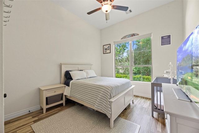 25010 Butler Hill Ct, Tomball, TX 77375 - bedroom featuring wood finished floors and ceiling fan