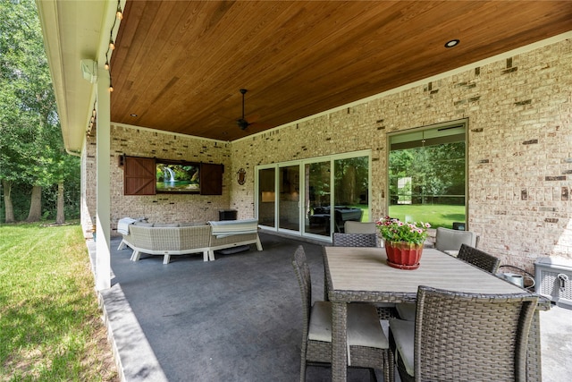 25010 Butler Hill Ct, Tomball, TX 77375 - view of patio featuring a grill and an outdoor living space