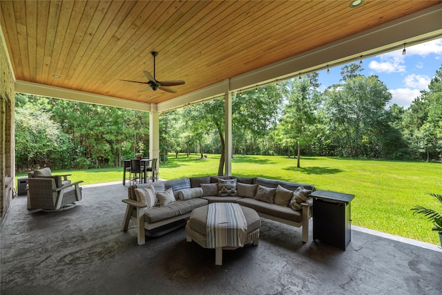 25010 Butler Hill Ct, Tomball, TX 77375 - view of patio / terrace featuring an outdoor living space, view of wooded area, and ceiling fan