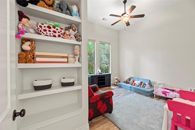 25010 Butler Hill Ct, Tomball, TX 77375 - game room featuring wood finished floors and ceiling fan