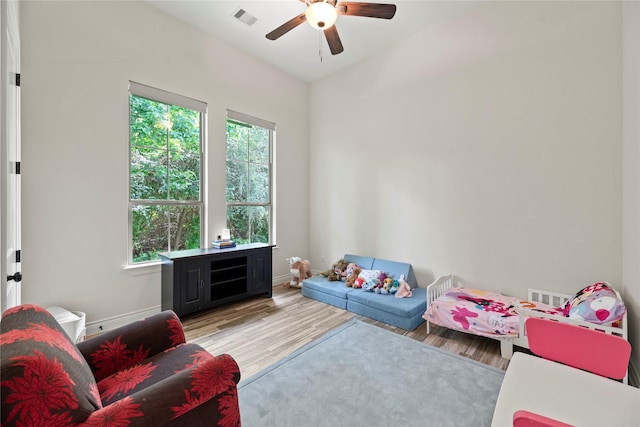 25010 Butler Hill Ct, Tomball, TX 77375 - recreation room with a ceiling fan and light wood finished floors