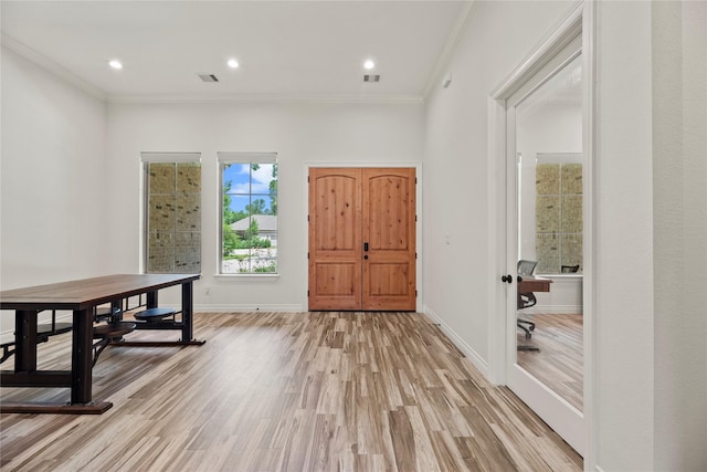 25010 Butler Hill Ct, Tomball, TX 77375 - entryway featuring crown molding, light wood-type flooring, and recessed lighting