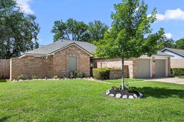 6114 Elkwood Forest Dr, Houston, TX 77088 - single story home with brick siding, concrete driveway, an attached garage, and a shingled roof