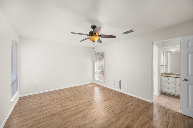 6114 Elkwood Forest Dr, Houston, TX 77088 - unfurnished room with ceiling fan and light wood-style floors