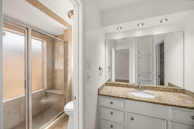 6114 Elkwood Forest Dr, Houston, TX 77088 - bathroom with vanity, a stall shower, and recessed lighting